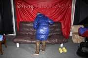 Sexy Sonja changing clothes to a brown down pants and a blue down jacket and lolling on the sofa (Pics)