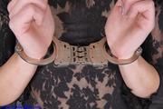 Arrested girl in black lingerie