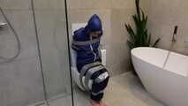 Myxxxy surprised by an Intruder in her Bathroom finally bound and gagged in Rainwear