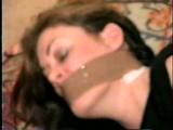 26 YEAR OLD RIVER VERY TIGHTLY WRAP TAPE GAGGED, PANTYHOSE FEET TICKLED, STUFFED MOUTH & DROOLING (D52-8)