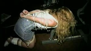 38 Yr OLD CASHIER GAGS HERSELF, IS TIED TO EXERCISE MACHINE & IS BLINDFOLDED (D35-12)