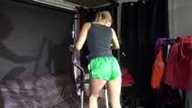 Watching sexy Sandra during her workout wearing a sexy green shiny nylon shorts and a black top (Video)