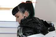 Jill bound and gagged in a shiny pvy sauna suit