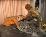 Latex Doll bound in a rubber bag