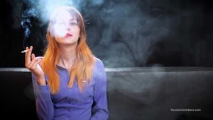 Smoke-generator Galya is smoking a delicious Marlboro Red and exhaling clouds of smoke