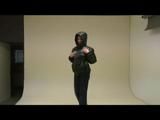 Stella posing infront of the camera wearing supersexy black rainwear and highheels (Video)