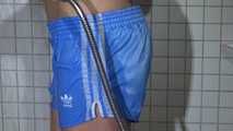 SEXY SANDRA in the shower with a sexy lightblue shiny nylon shorts and a top (Video)
