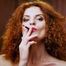 Wild and free girl Yuliya is definitely enjoying a strong 100mm black cigarette
