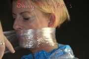 Watching sexy Pia being envelopped in film wearing a sexy blue shiny nylon shorts and a lightblue shiny nylon rainjacket (Pics)