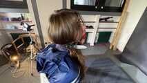 Marie bound and gagged in shiny nylon Rainwear