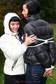 Jill ties her friend in shiny downjackets
