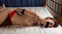 Tapegagged barefoot topless Kim, hogtied with hemp rope, is tickled by the man