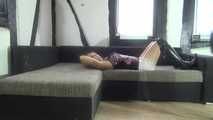 Ayu hogtied on couch 1/2