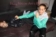 Part 2 of Stella overpowering intruder Ronja both wearing shiny nylon!