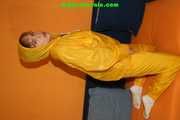 Get 236 pictures of Leoni in shiny nylonrainwear from 2005-2008