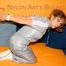 Beautiful archive girl tied and gagged wearing a shiny grey nylon jumpsuit(Pics)