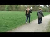 Katharina and her friend wearing shiny nylon rainwear while playing soccer (Video)