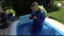 Pia ties and gagges herself in a small swimming pool wearing sexy lightblue downwear (Video)