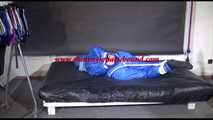 Lucy tied and gagged with ropes on bed wearing sexy blue oldschool downwear (Video)