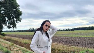 Our new model Miss Amira in transparent Hunter rain jacket and patent sprinter shorts