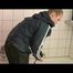Jenny taking a shower in her flat wearing sexy shiny nylon rainwear (Video)
