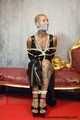 Miss Francine bound and gagged with layers of gags in a sexy PVC dress