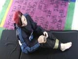 Jill ties and gagges herself in a shiny nylon rainsuit with tape (Video)