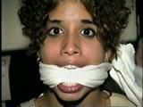 SWEET LATINA MARIE IS BALL-GAGGED, OTM-GAGGED, WRISTS-GAGGED, CLEAVE-GAGGED, MOUTH STUFFED & HANDGAGGED (D48-4)