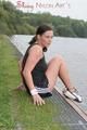 Enni outdoor wearing a sexy black shiny nylon shorts and a black top (Pics)