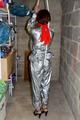 Nicole in an silver shiny PVC sauna suit tied and gagged in an cellar (Pics)