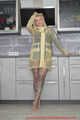 Miss Francine in yellow Schmuddelwedda raincoat