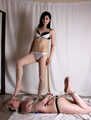 Tiri dominates hogtied barefoot Bianca
