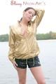 Enni having a good time outdoor wearing sexy shiny nylon shorts and a top posing for the camera (Pics)