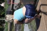 Watching sexy Sonja wearing her dark blue  shiny nylon shorts and a tshirt walking through the pedestrian area (Pics)