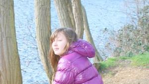 Alina during her walk on the sea wearing sexy shiny nylon down jacket and a shiny nylon shorts under her jeans (Pics)