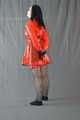 Bound in PVC minidress and red raincoat