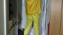 Pia wearing sexy yellow shiny nylon rainwear cleaning up the studio (Video)