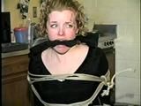 19 YEAR OLD COLLEGE STUDENT SHANA IS TIGHTLY BOUND TO A CHAIR AND HAS HER MOUTH STUFFED & CLEAVE GAGGED ON SCREEN 2 TIMES (D53-10)