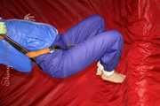 Sexy Sonja being tied and gagged with ropes and a clothgag hanging wearing a sexy rainwear combination (Pics)