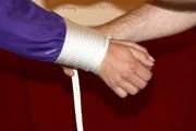 Isabelle tied and gagged in shiny nylon clothes