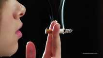 A young lady showing her smoking skills in a closeup video 
