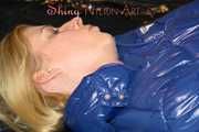 Pia lying on the bed wearing a sexy rainpants anda bra and putting on a pamy down jacket (Pics)
