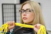 Leatherlady in yellow ropes