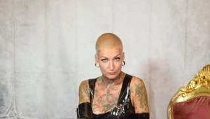 Miss Francine bound and gagged with layers of gags in a sexy PVC dress