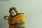 Angel tied up in blankets