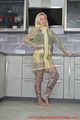 Miss Francine in yellow Schmuddelwedda raincoat