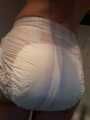 Tena diaper, skinny jeans and red shirt