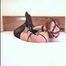 Liska - Playful redheaded amateur partaking in a crazy self-bondage session (video)