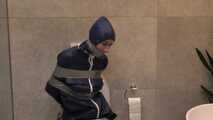 Myxxxy surprised by an Intruder in her Bathroom finally bound and gagged in Rainwear