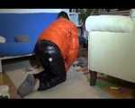 Mara sorting newspapers and lolling on the floor and the sofa wearing sexy shiny nylon downwear (Video)